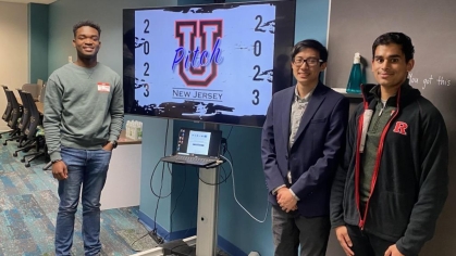 3 winners pose in front of UPitch graphic